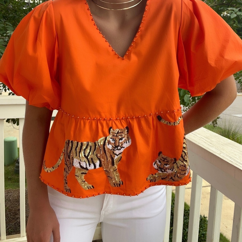 Queen of Sparkles Orange Tiger Peplum Top